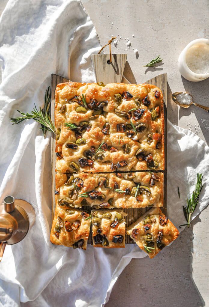 Rosemary Focaccia from PASTA 9 Toronto, oven-baked bread with olive oil, herbs, and sea salt, served warm as a handcrafted Italian favorite.
