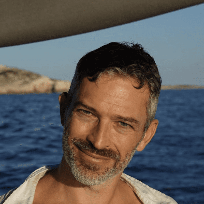 A man smiling for a photo