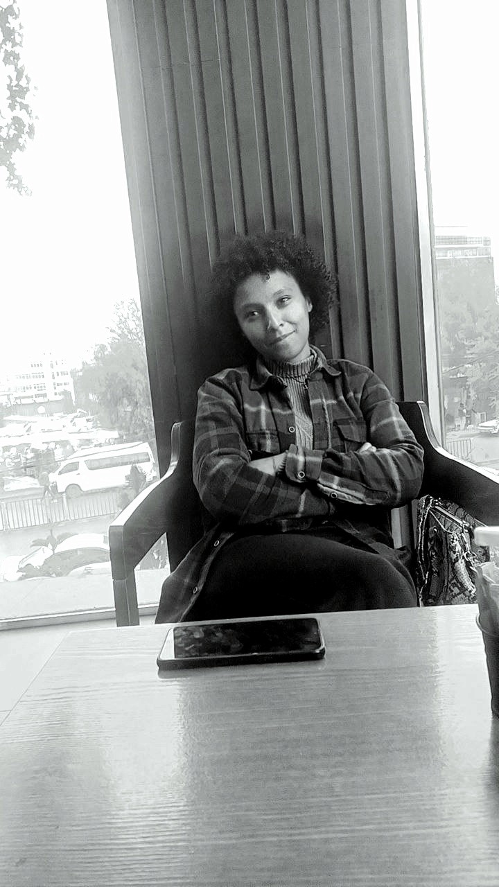 a person wearing a baseball cap