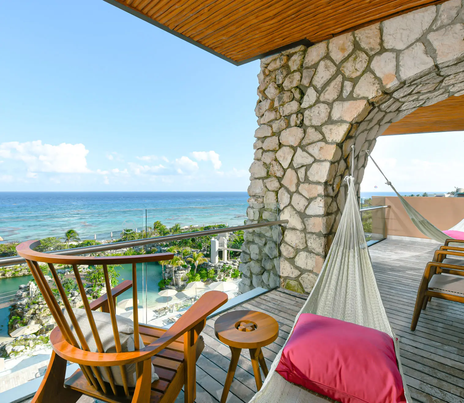 silhouette of man and woman holding fishing rod standing on dock during sunset
