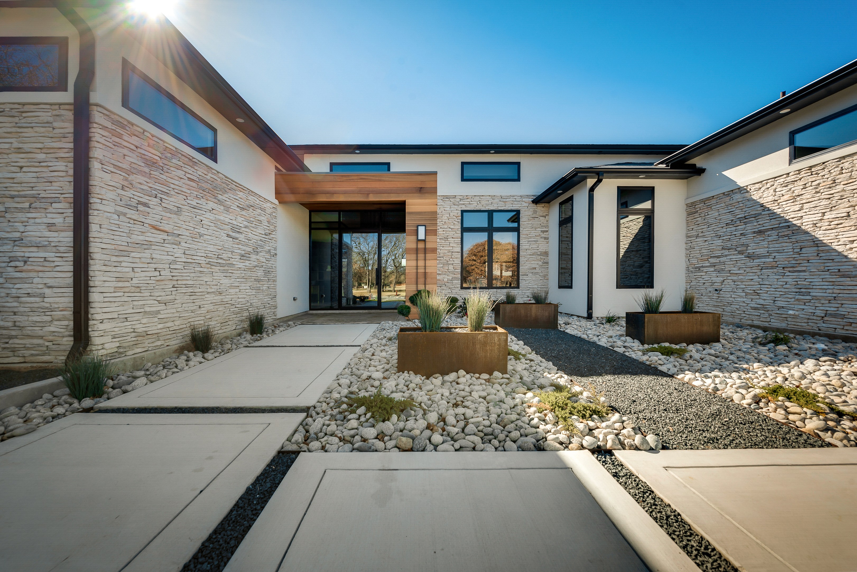 Traditional wrought iron double doors by M2 Metals Iron Doors DFW