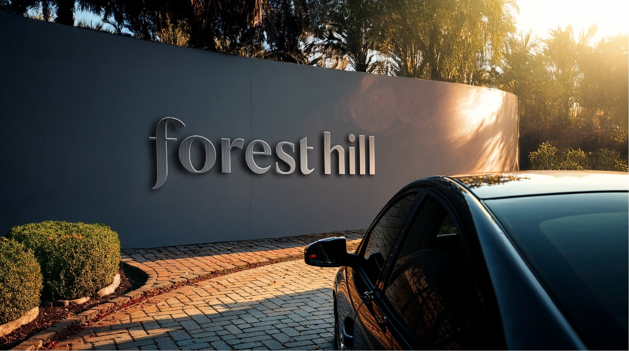 Rendered Forest Hill entrance sign wall at dusk with a car arriving