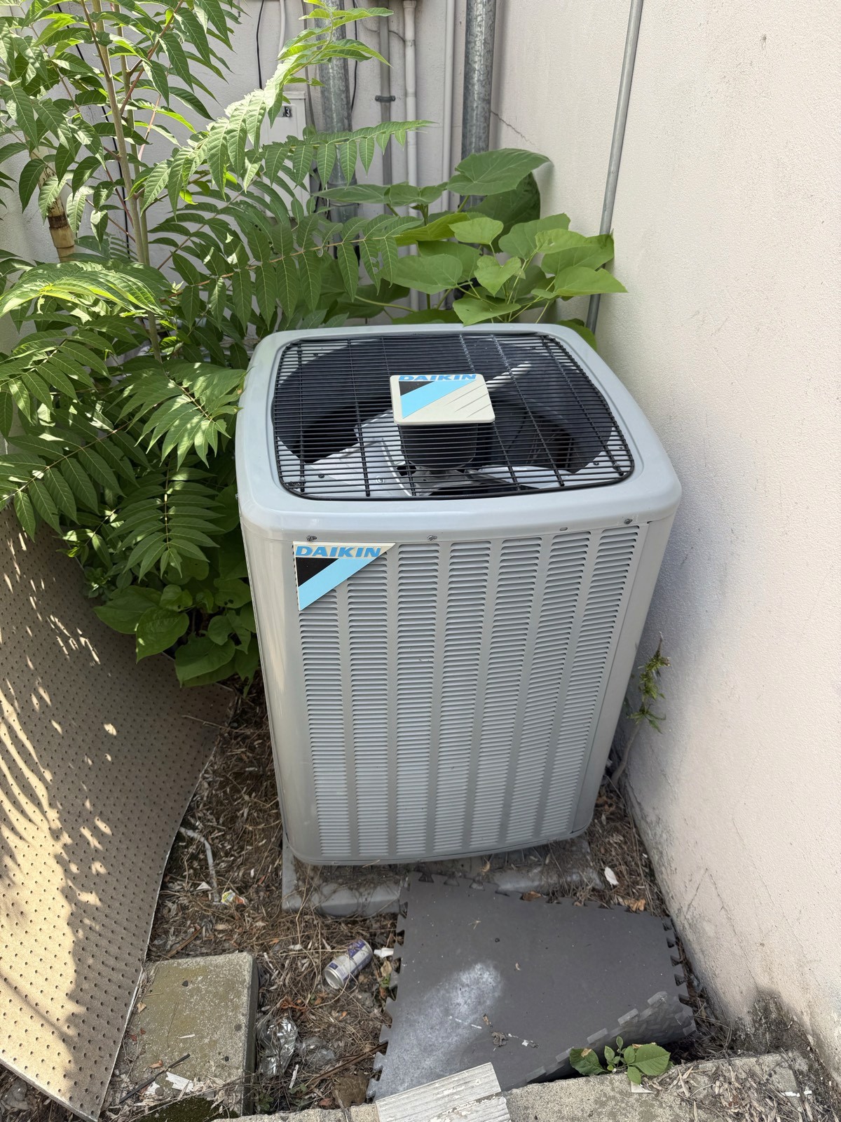 Daikin outdoor condensing unit beside a Boise commercial building.