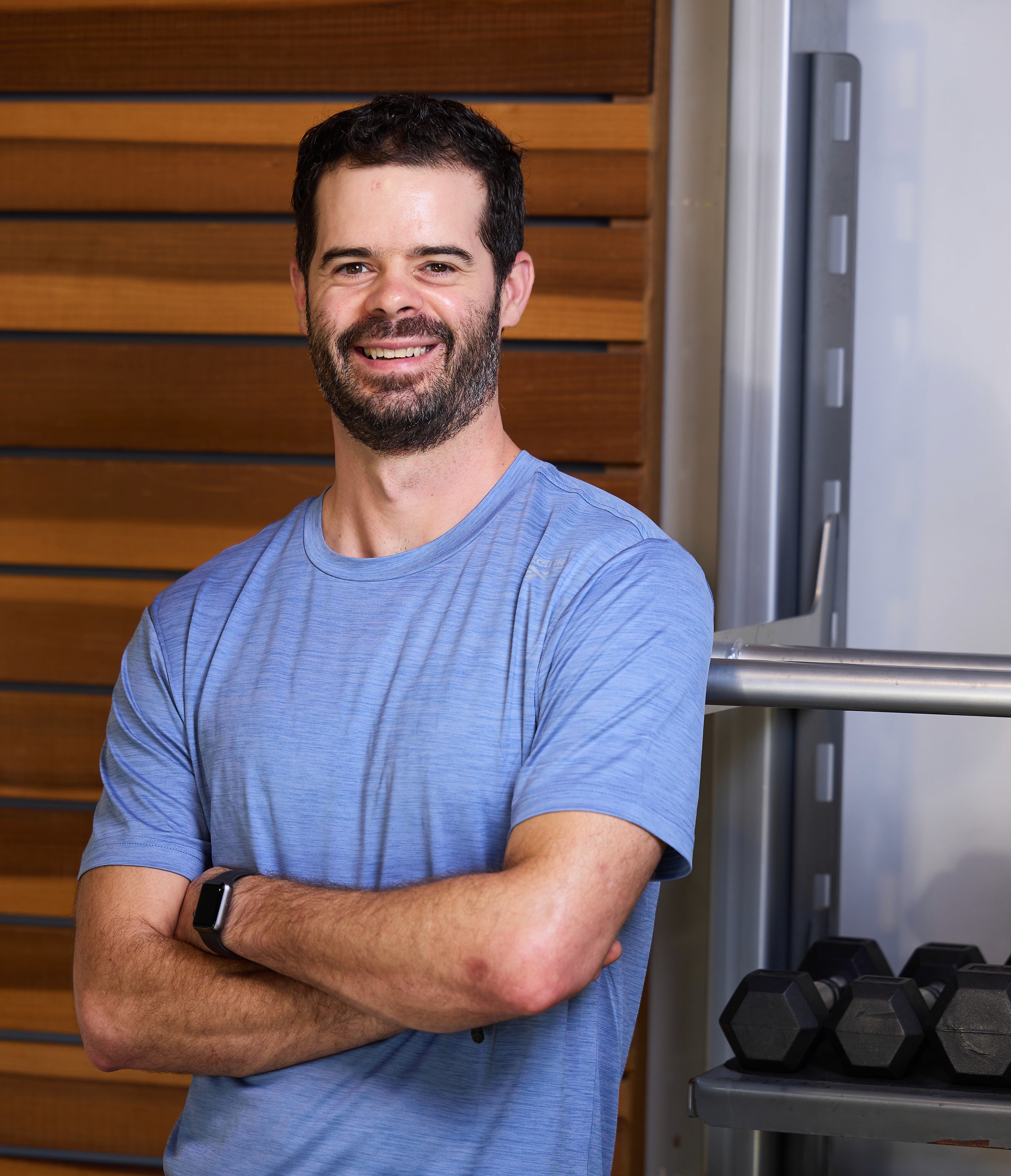 Group of men standing with Sufboard