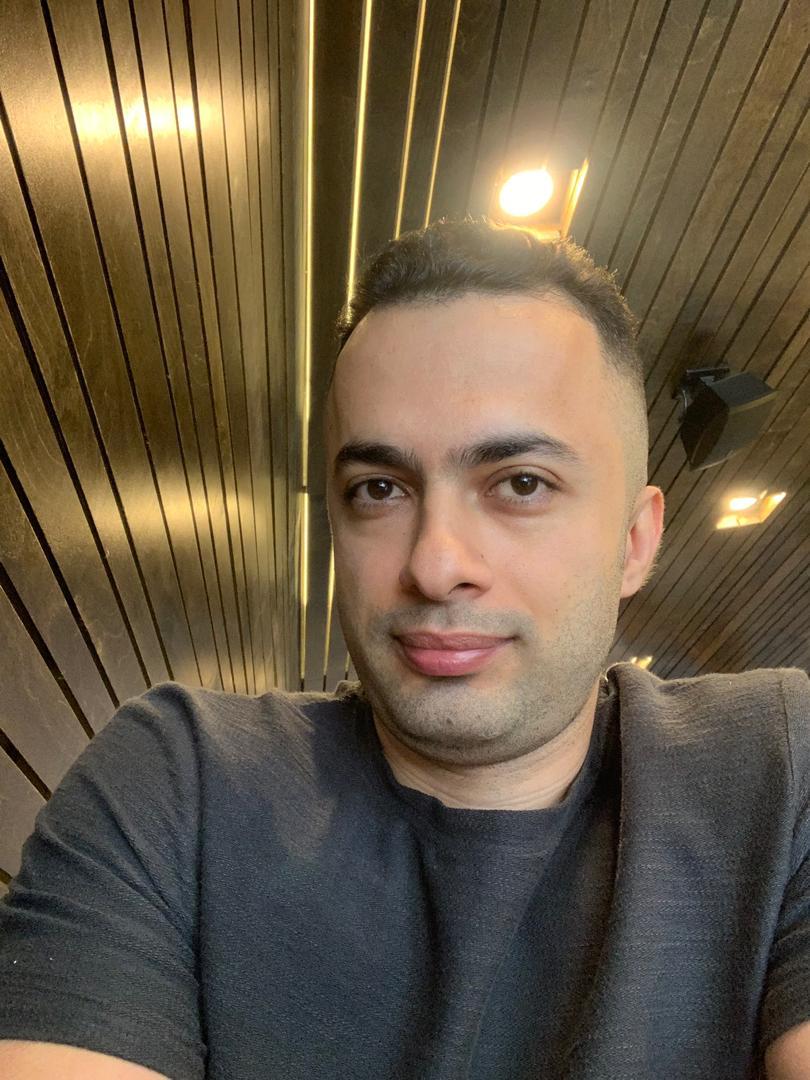 Portrait of a young man on a blue background