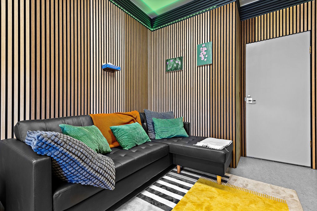 Female yoga instructor teaching a client