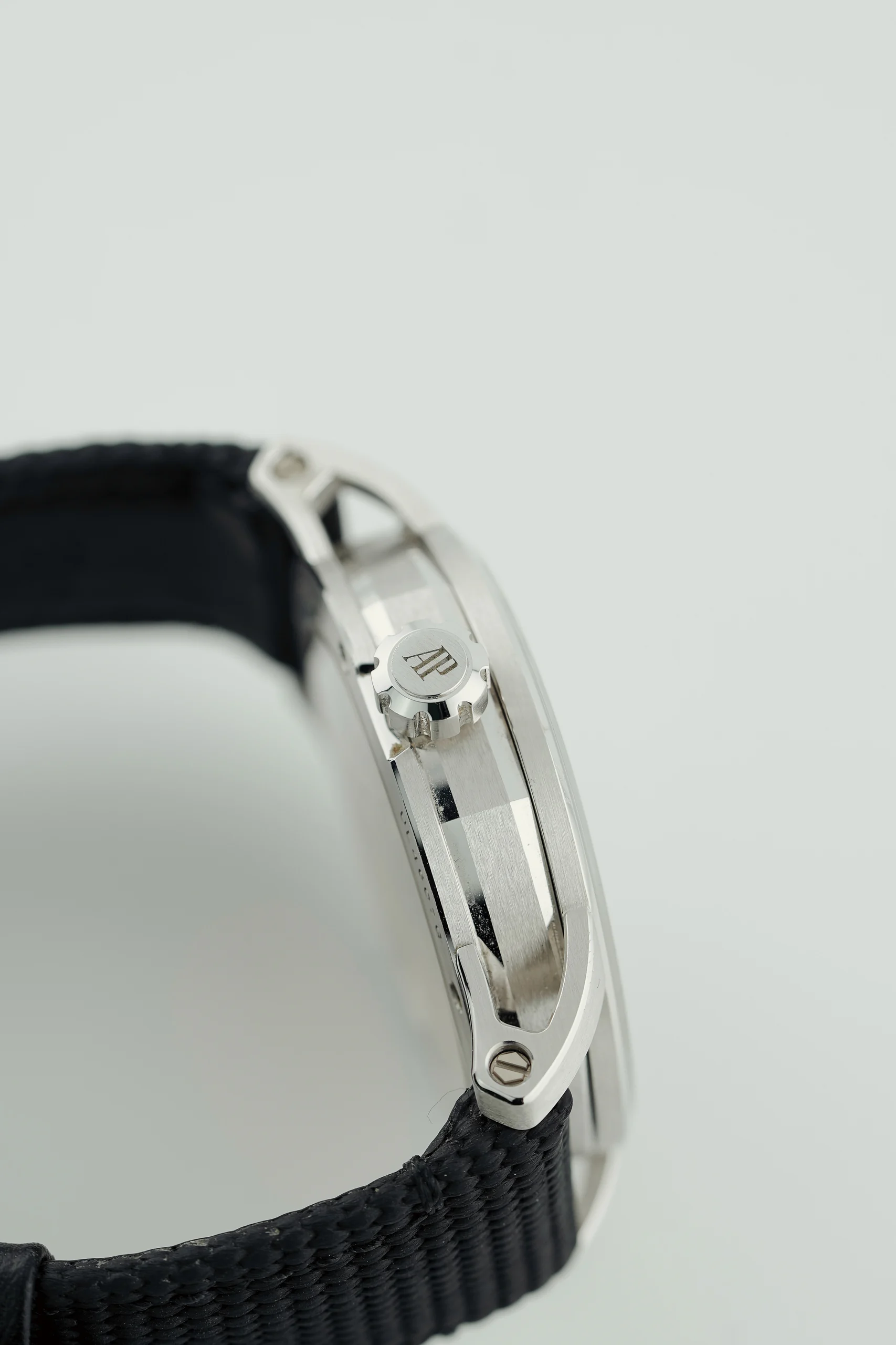 Side profile of the Audemars Piguet Code 11.59 Selfwinding White Gold 15210BC showing the crown