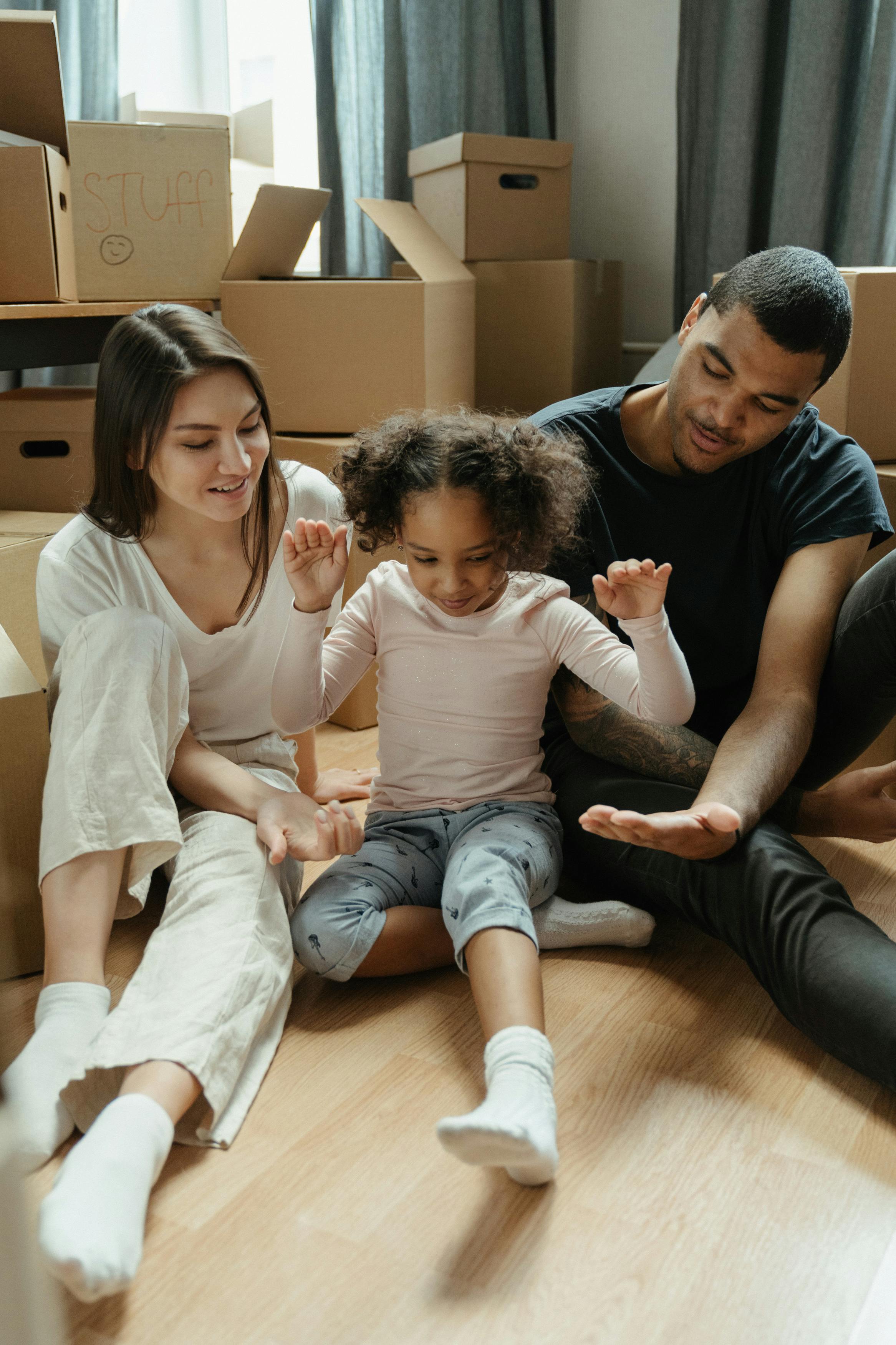 Happy family of three in a property and they just moved in