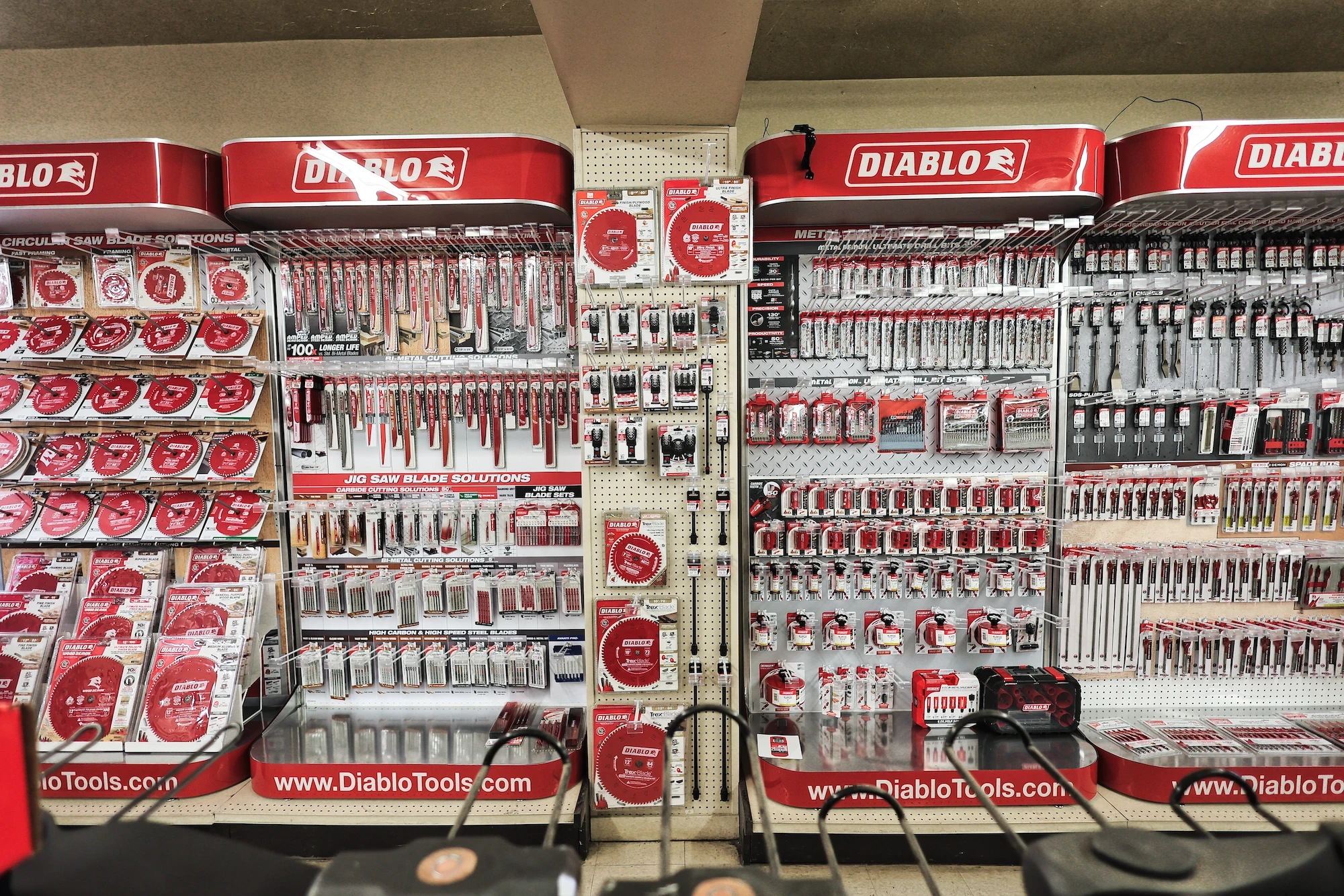 Organized Diablo blades, bits, and tools displayed inside Capital Lumber