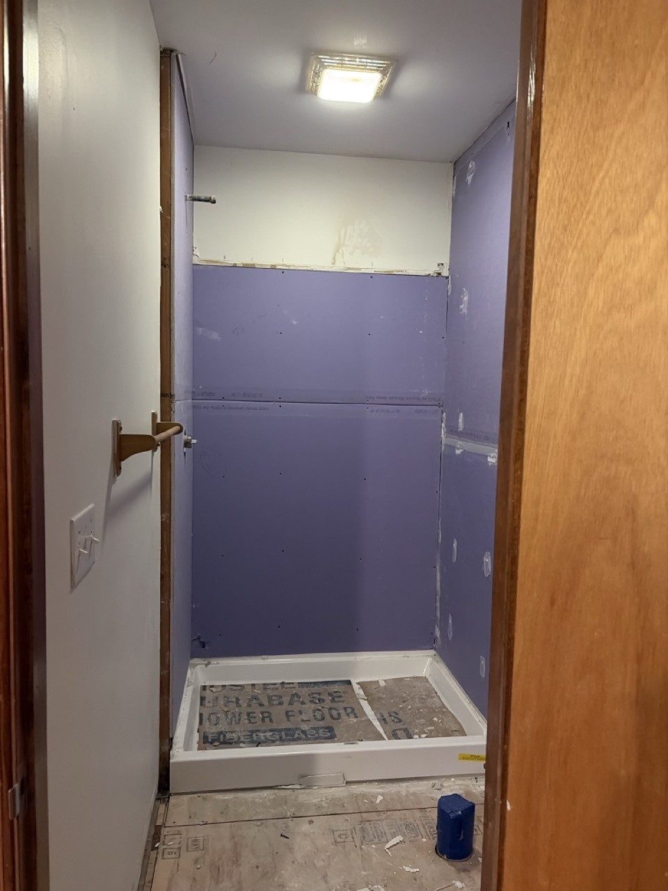 Shower alcove primed and prepped before the new surround goes in