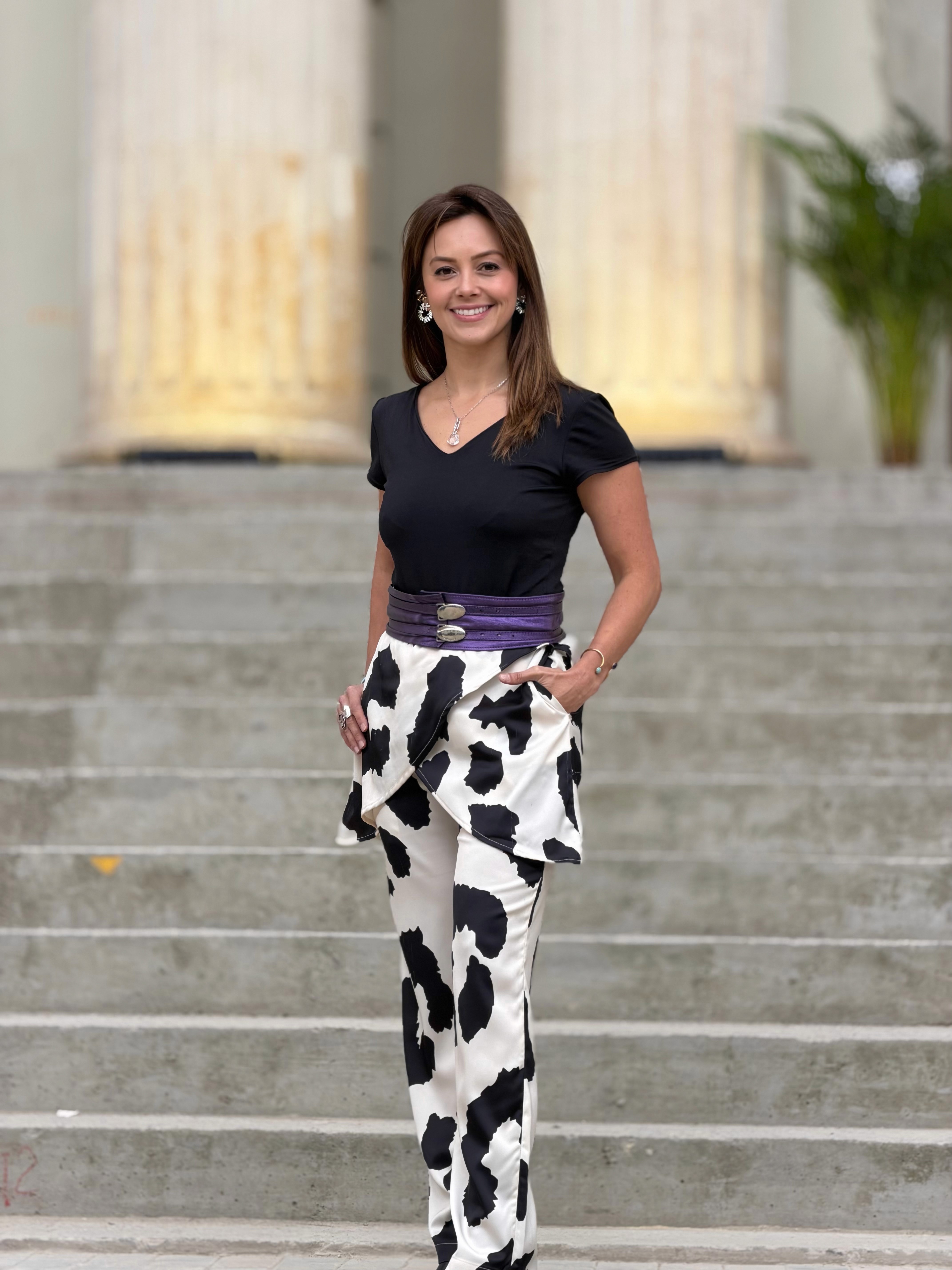 Creative portrait with geometric pink eyewear and bold fashion styling in urban setting