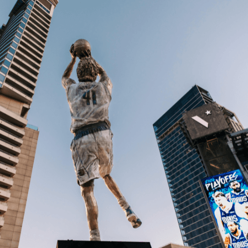 brown basketball on basketball hoop