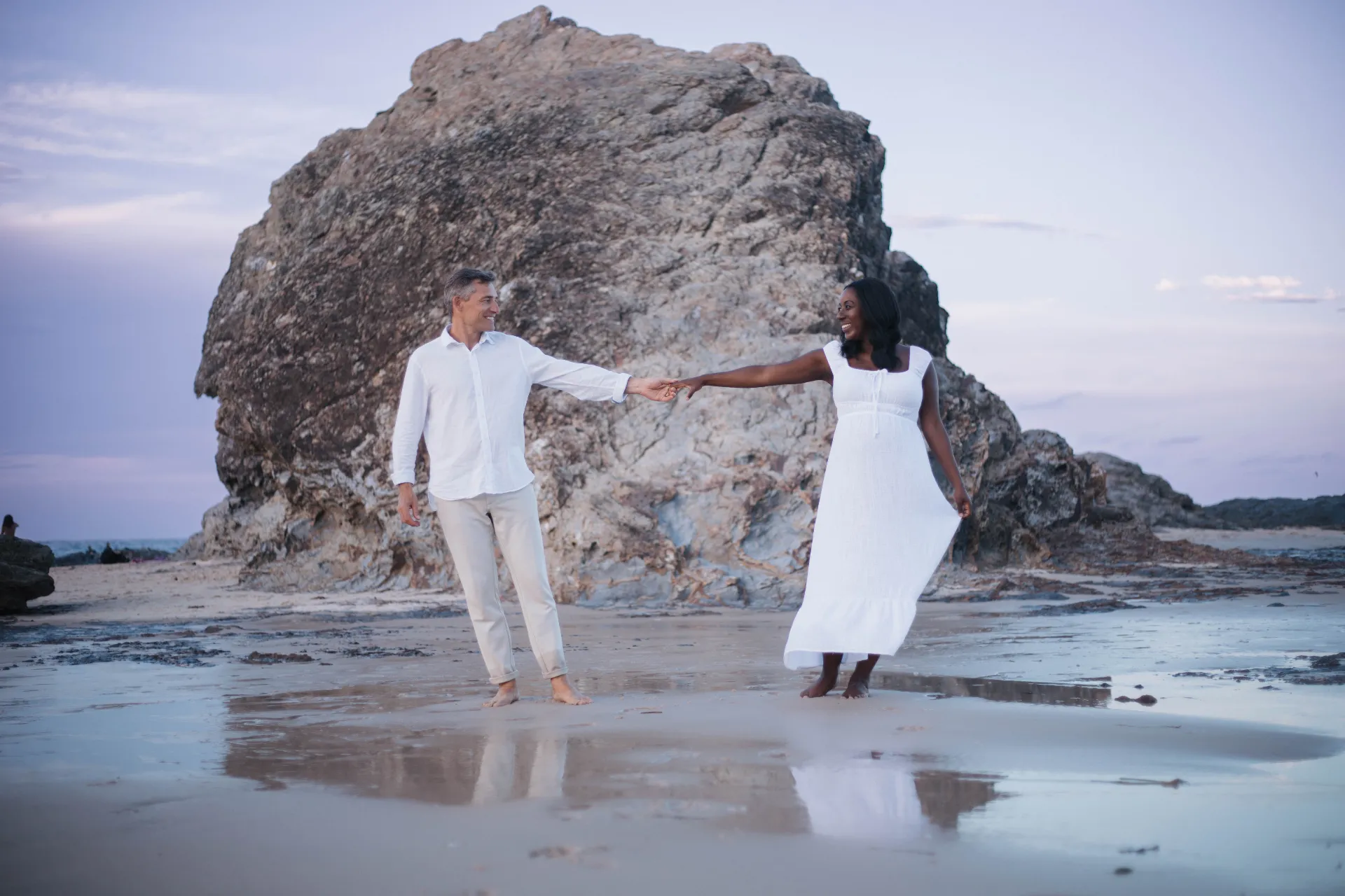 man and woman holding hands focus photo