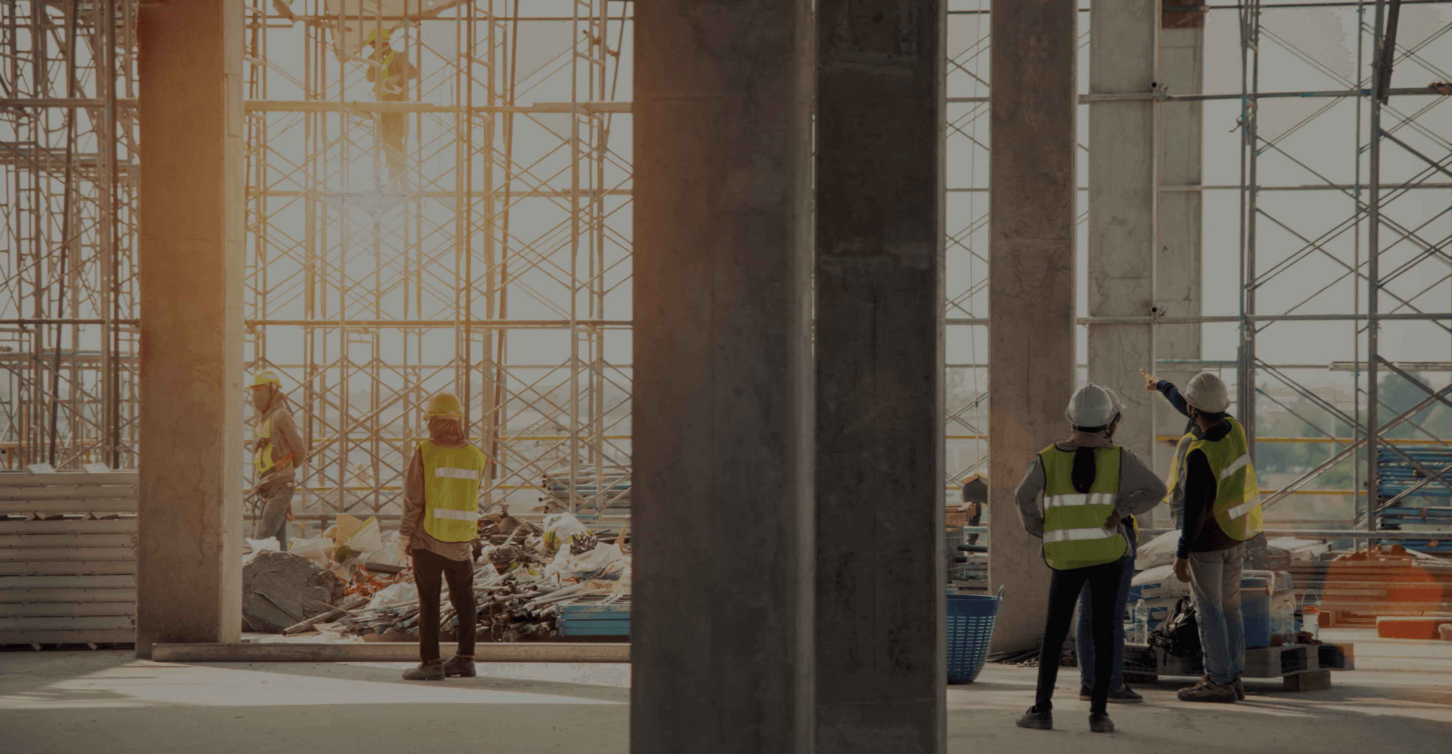 Workers standing in a construction site