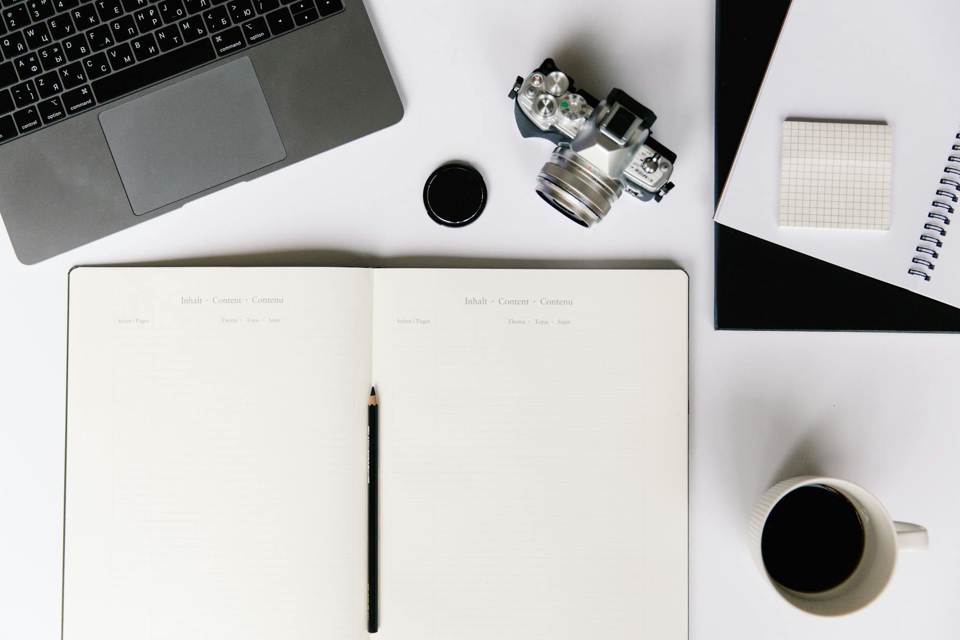 Close-up of a person filling out a standardized test bubble sheet with a sharpened yellow pencil.