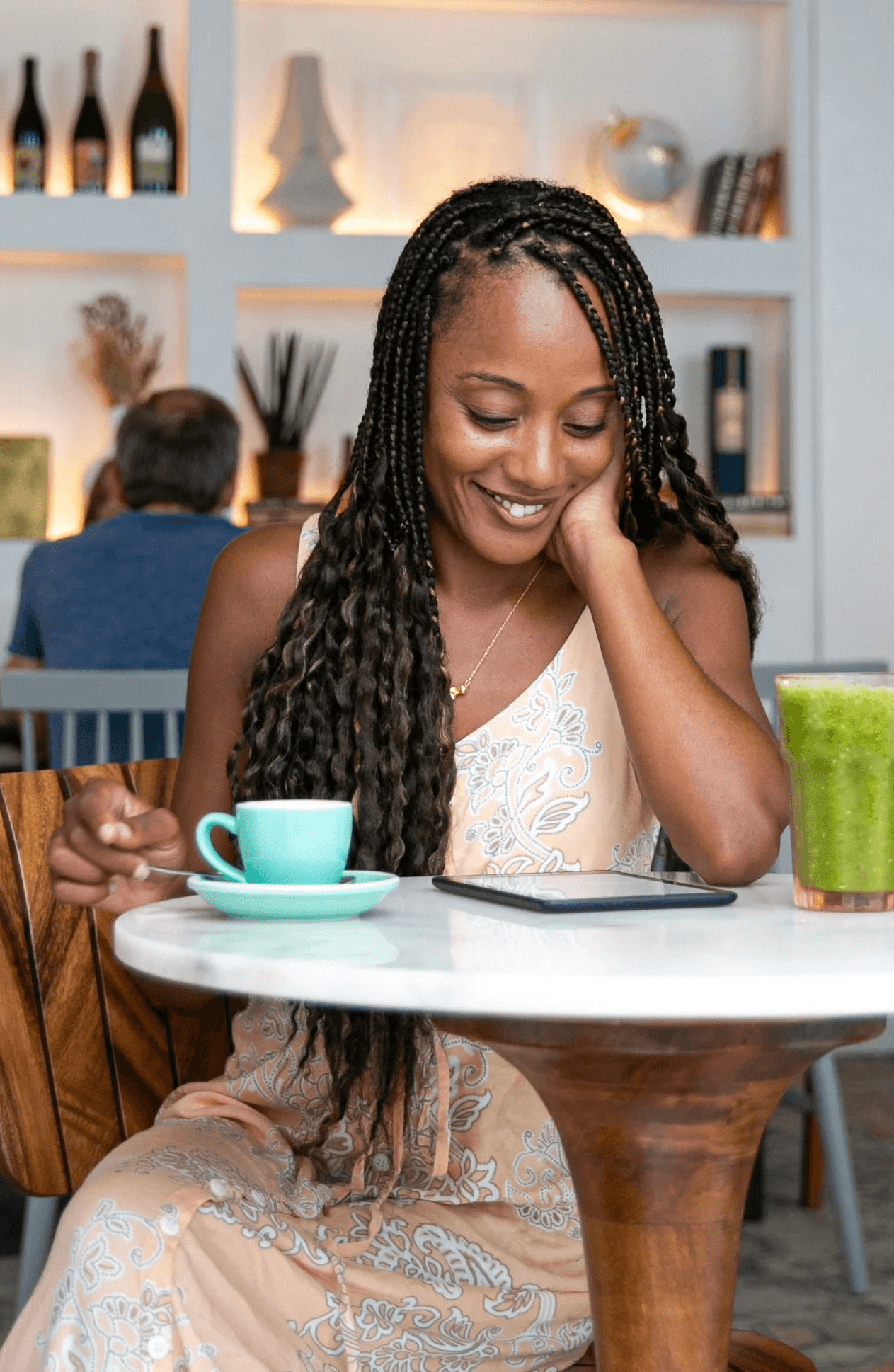 Rita Batalha in a cafe with a green juice