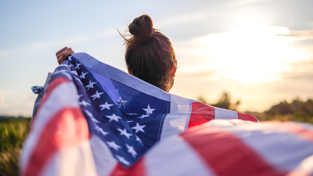 Woman holding an American flag
