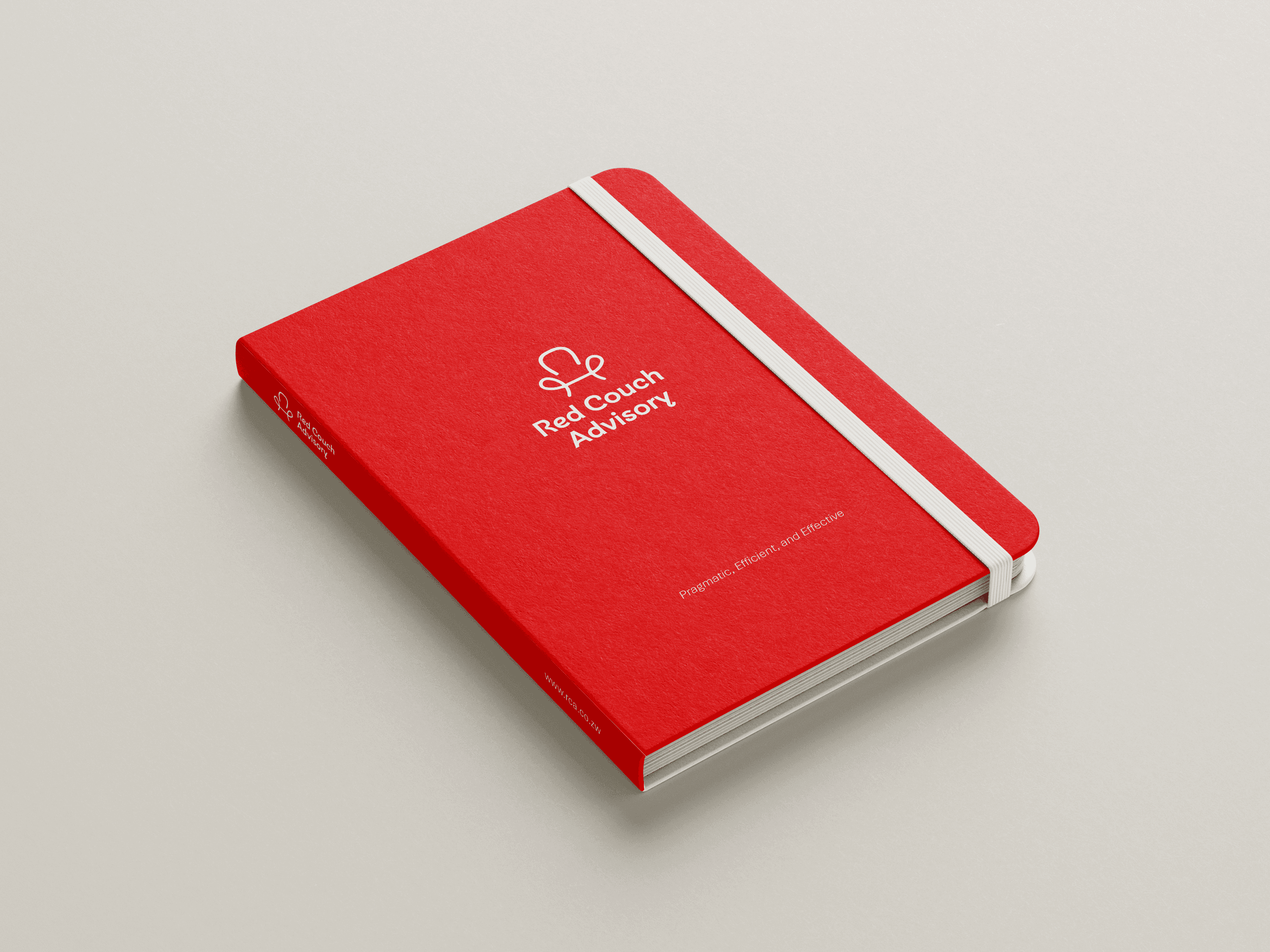 A red minimalistic notebook of Red Couch Advisory