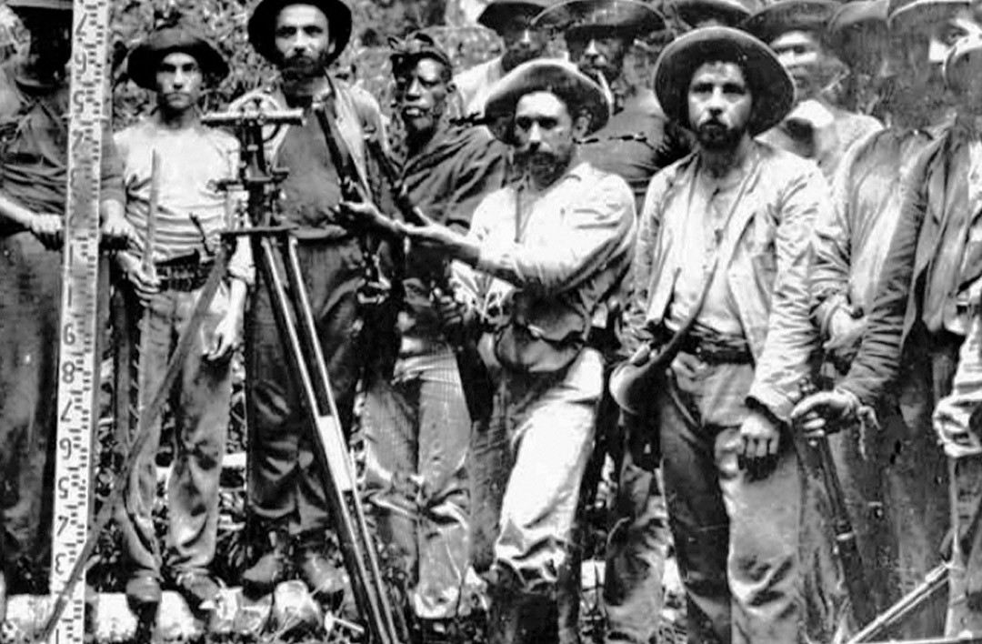 woman in blue hijab sitting on chair
