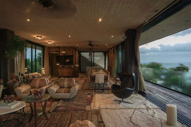 Luxurious villa with large sofas, great lighting, and unique harmony. Carpeted with spectacular jungle views at Be Tulum.