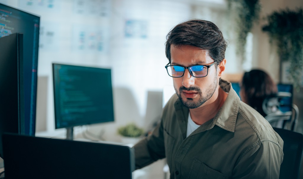Financial Analyst reviewing data