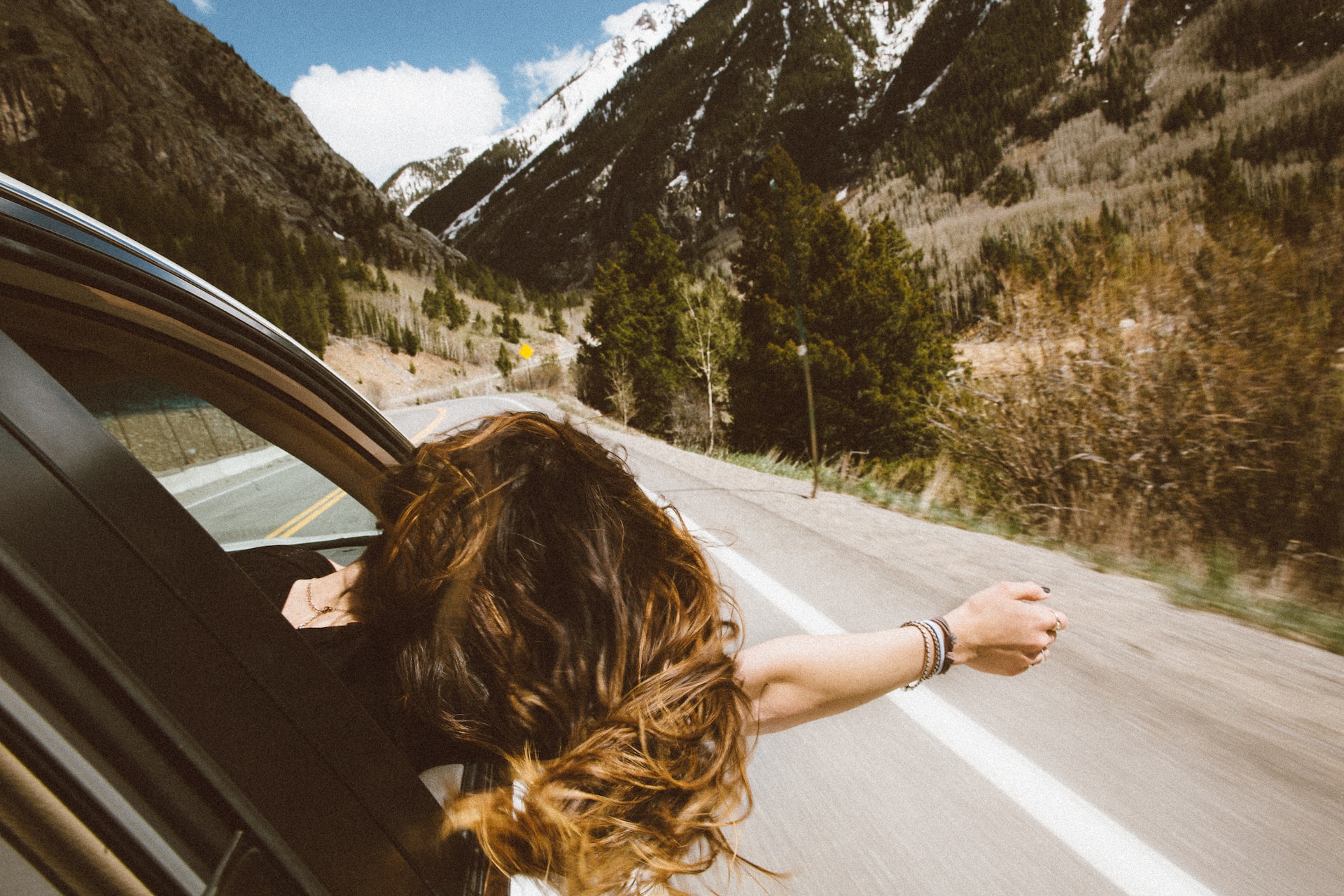 Girl enjoying roadtrip