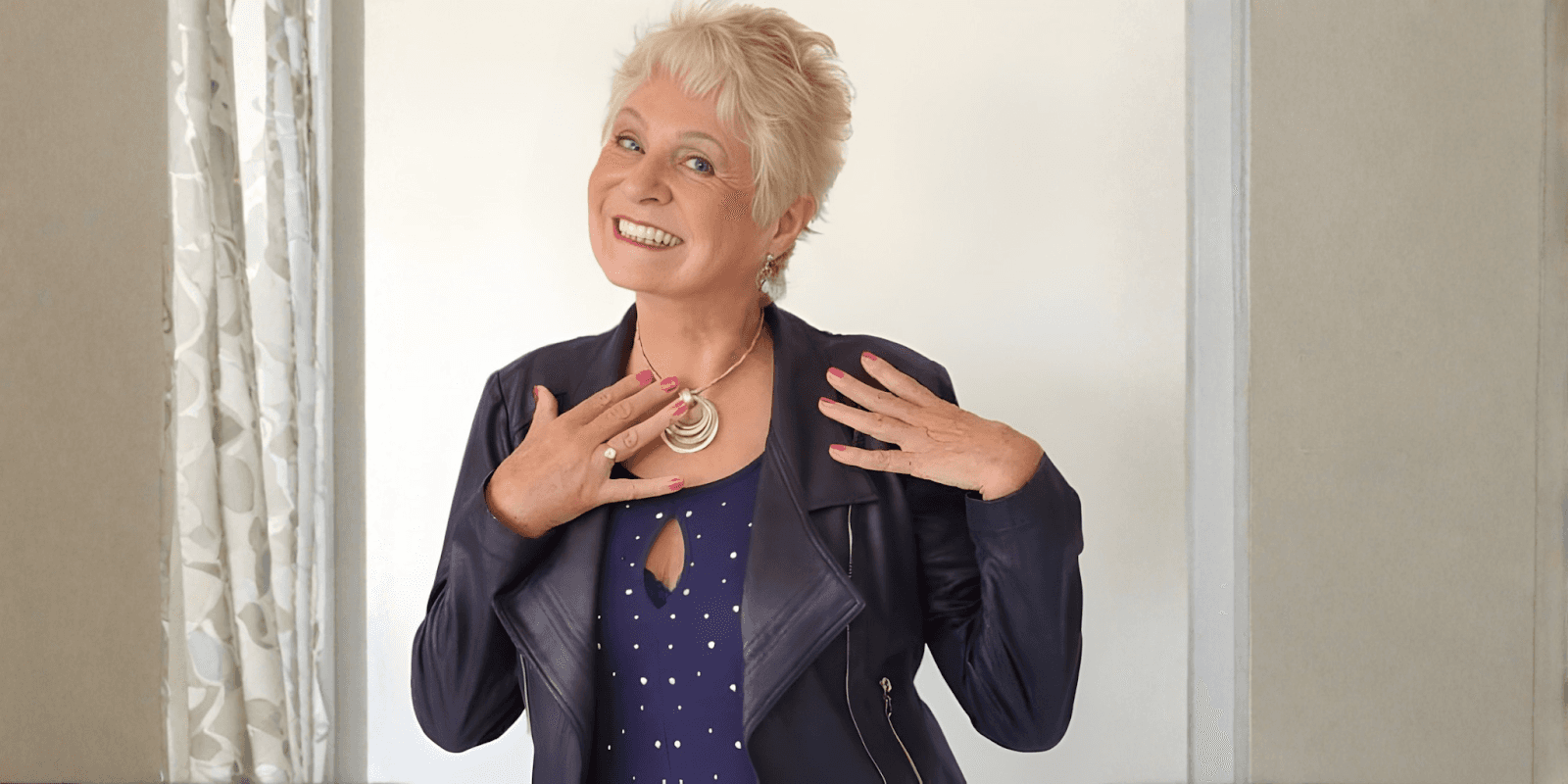 "Dr. Yvonne Oswald smiling while promoting her rapid emotional healing method for quick transformation through neuroplasticity and NLP."