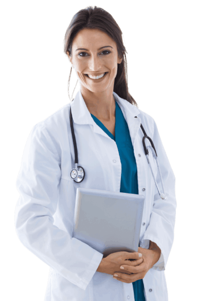 A medical professional smiling and standing in front of the camera