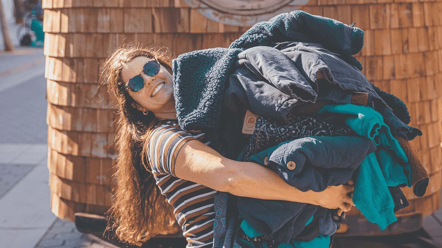 person writing on a piece of paper 