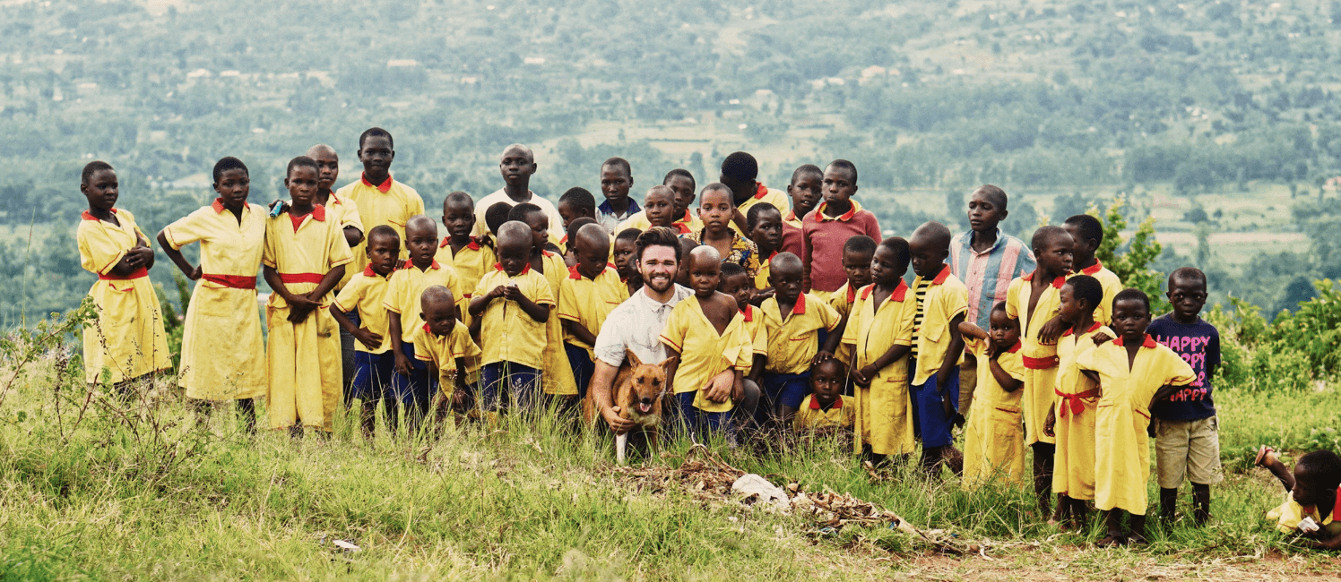 founder of gem studio with kids in uganda