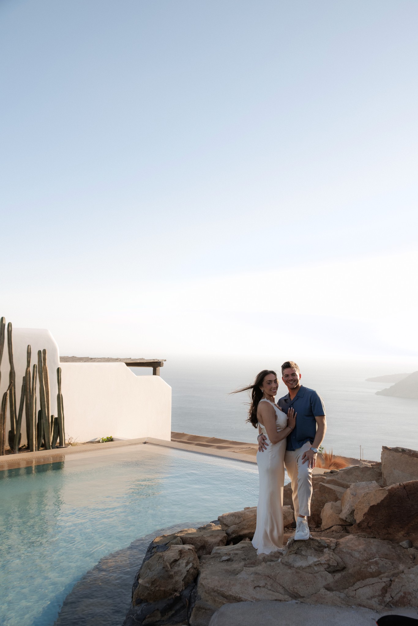 Fashion photoshoot with a woman posing in a dress
