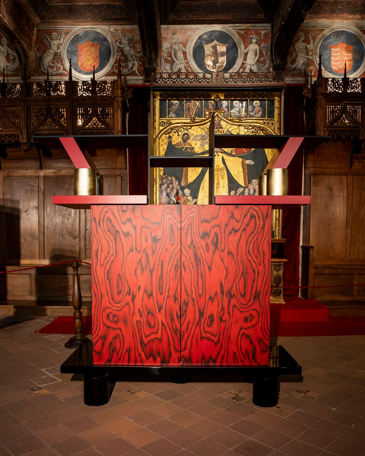 Roots Altar cabinet with designer Jiri Krejcirik posing in exhibition setting at PAD Paris