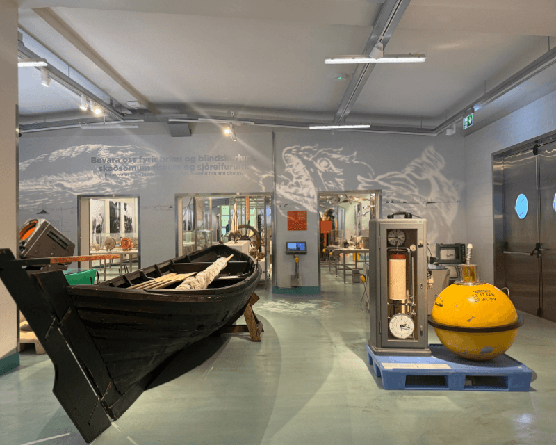 Interior of Reykjavik Maritime Museum with historic fishing boat and exhibits showcasing Iceland’s maritime heritage—cultural attraction and one of the things to do in Reykjavik.