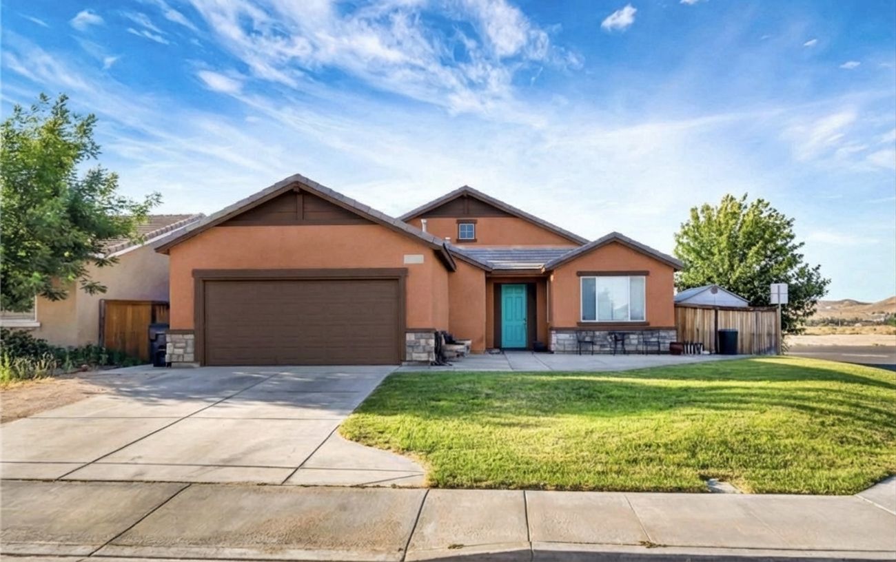 House exterior painted terracotta with turquoise door using AI paint visualizer