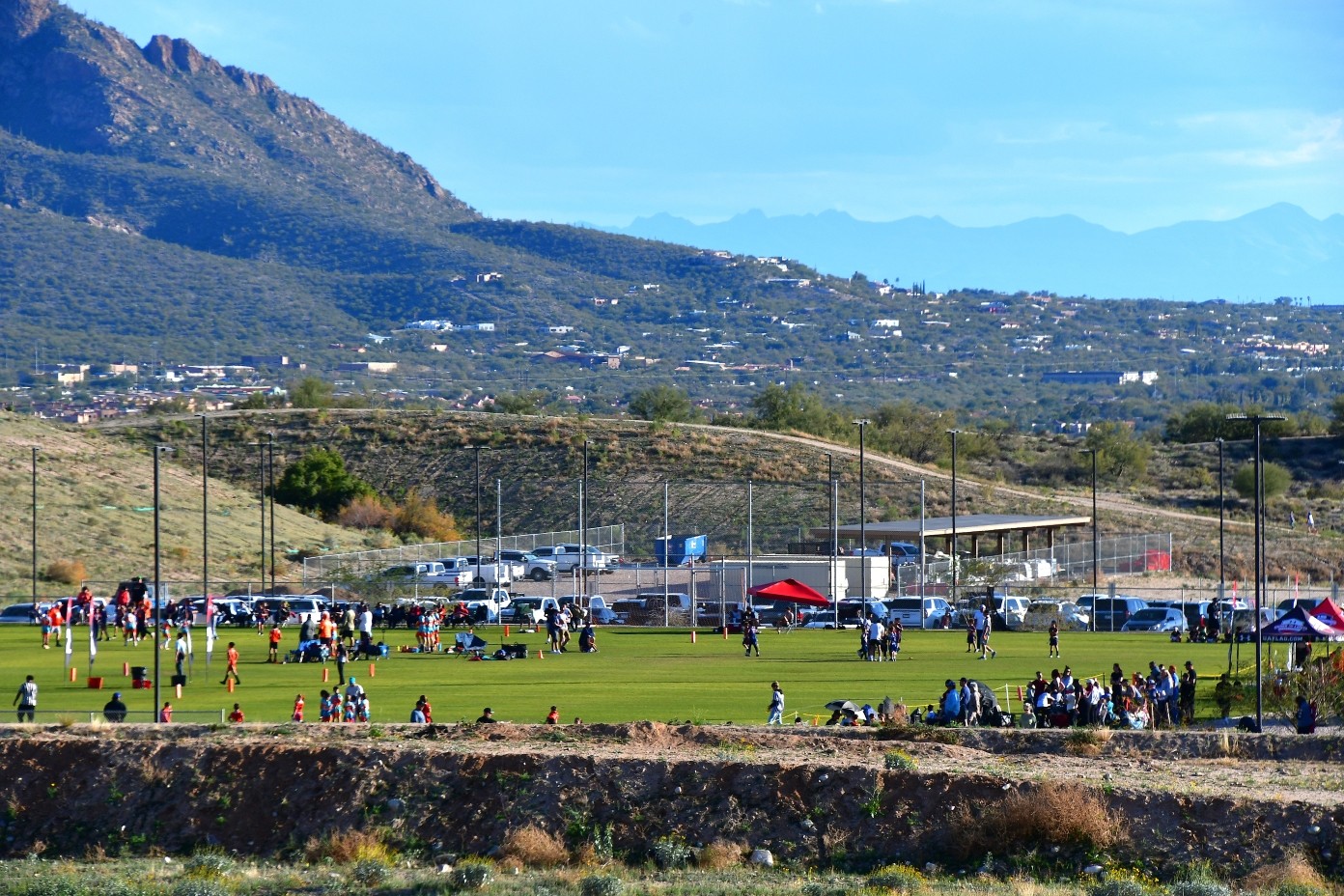 Oro Valley Pusche Ridge Mountains and a beautiful golf course and pond.