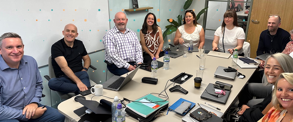 lean tree employees meeting together