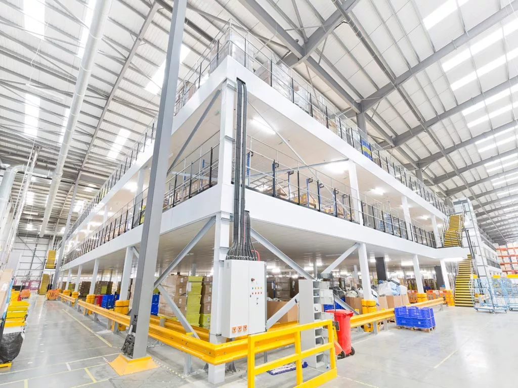 Delivery Woman holding package and smiling to the camera