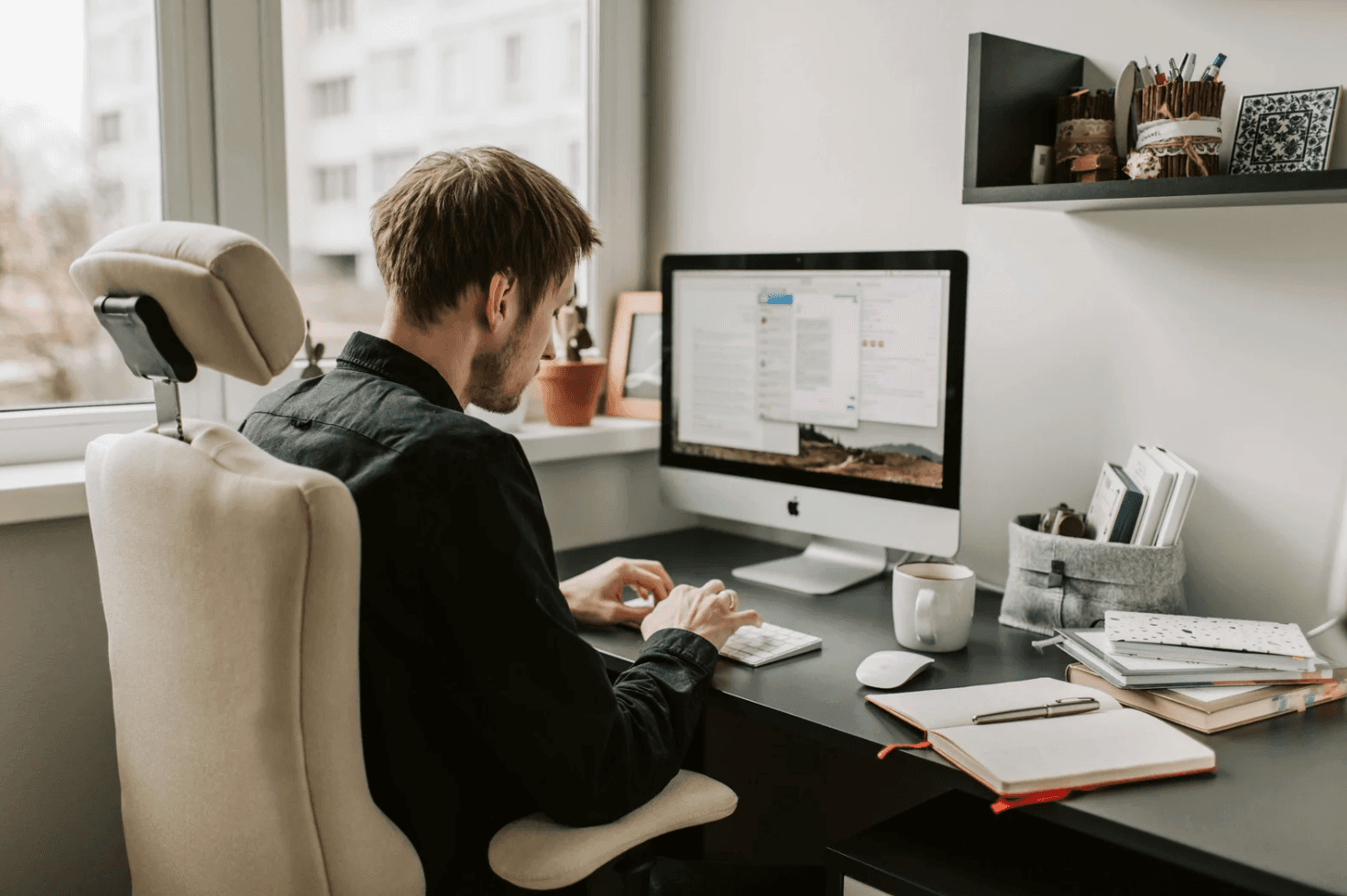 Amazon seller managing PPC campaigns independently on desktop during critical Q4 sales period