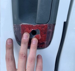 Broken door lock on commercial vehicle before repair in Calgary