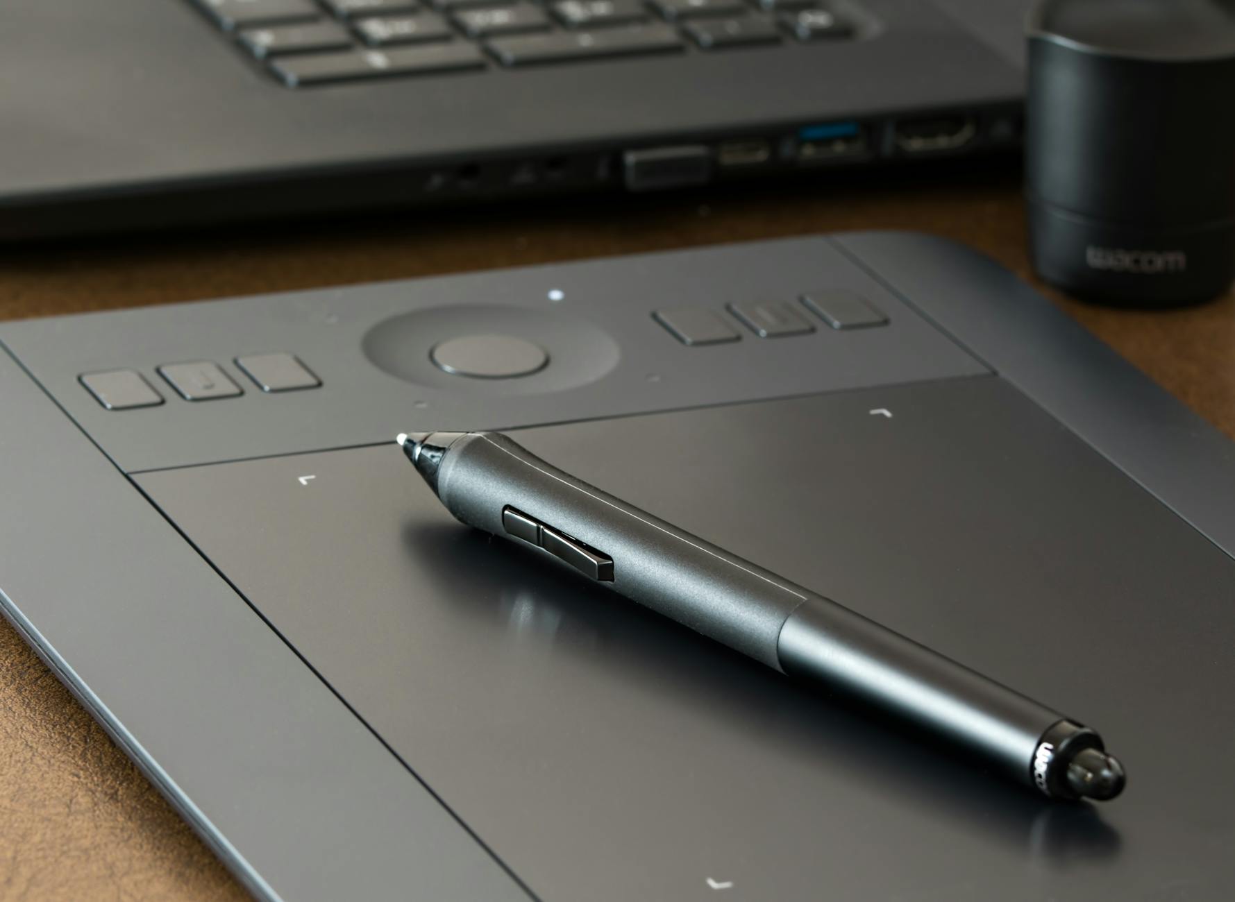 An overhead view of a clean workspace with a laptop, a smartphone, and a planner ready for the school week.