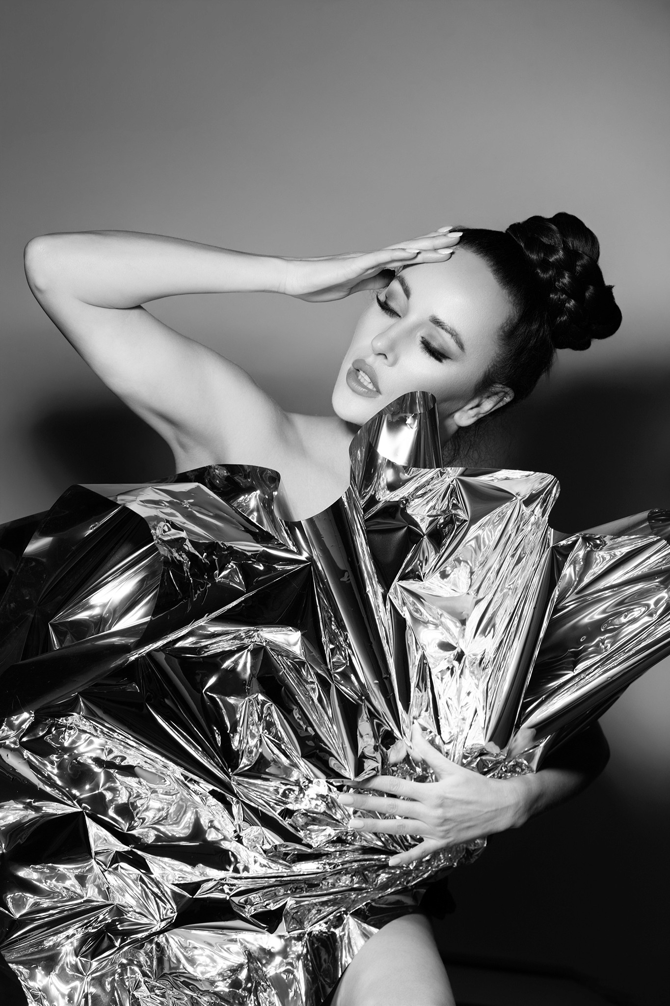 Light on chrome fabric and woman's skin, studio shot - Chrome - Agnieszka Czyzkowska Photography