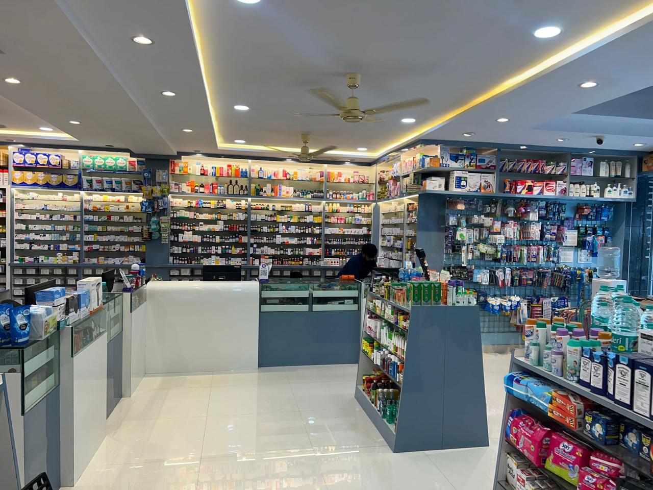 Pharmacist helping a customer at the counter