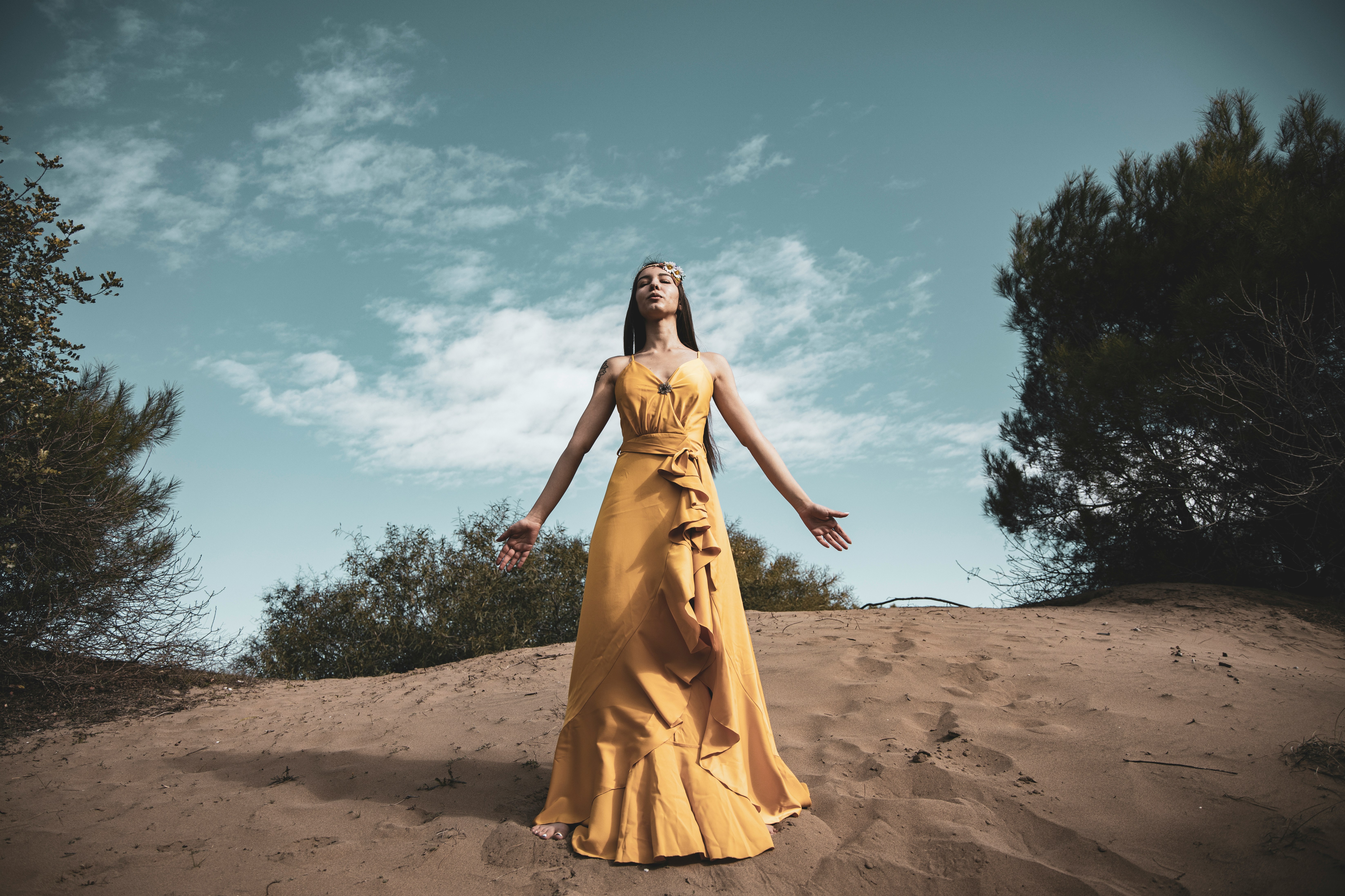 Girl Standing on Sand- Trendy Fall Outfits