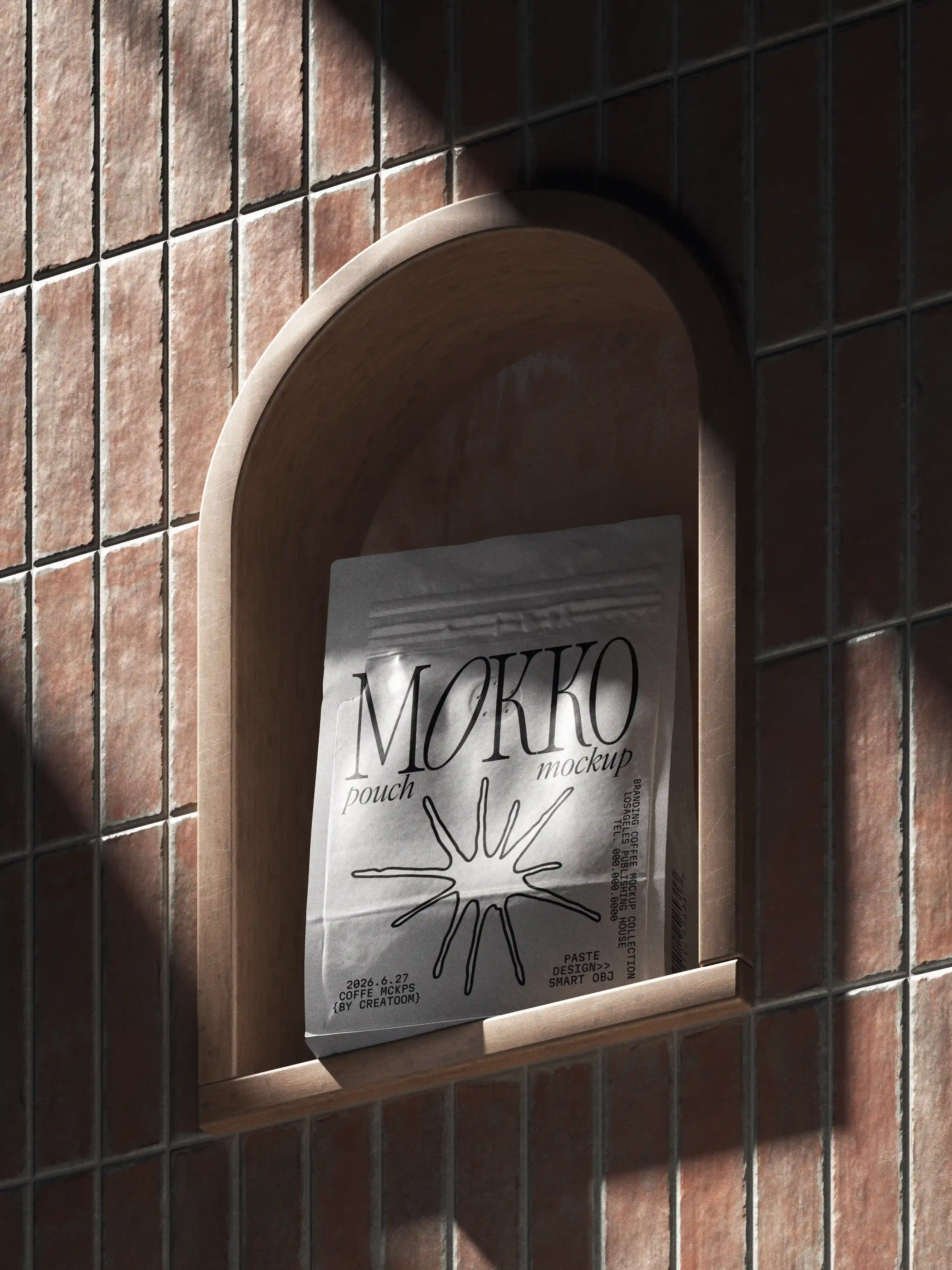 Sidewalk sign with Mokko branding next to terracotta wall and cactus