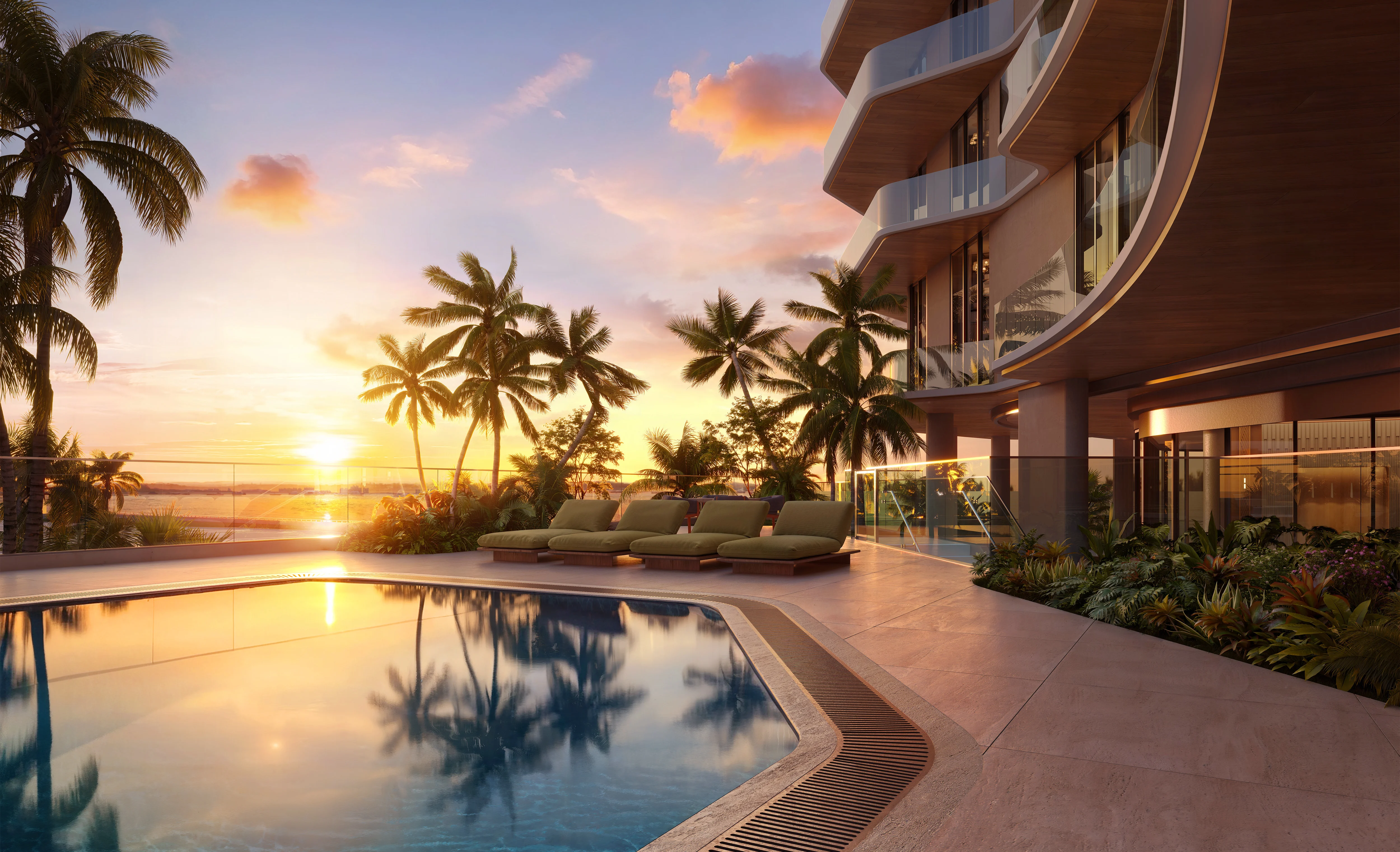 A pool with lounge chairs is situated in front of a modern building, creating a relaxing outdoor space.