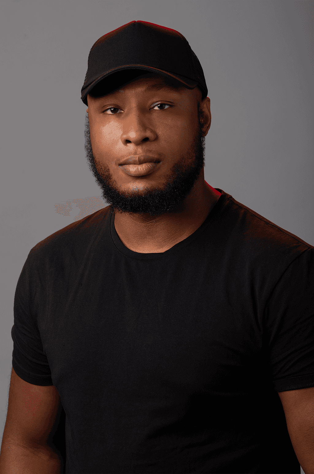 Kneeling man in studio