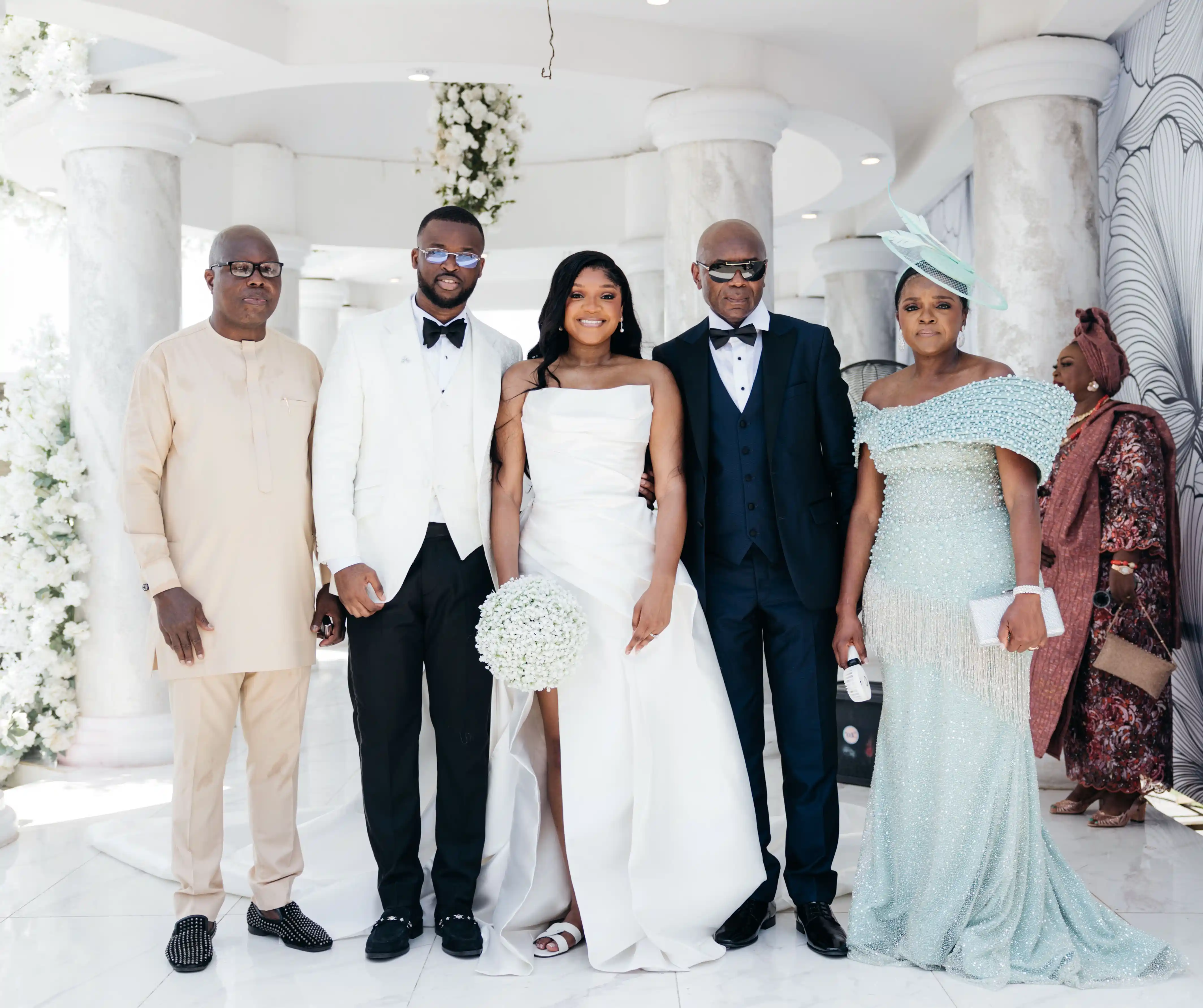 Bride and groom celebrating a luxury wedding coordinated by Victoria Brooks Events, a premium wedding planner in Nigeria.