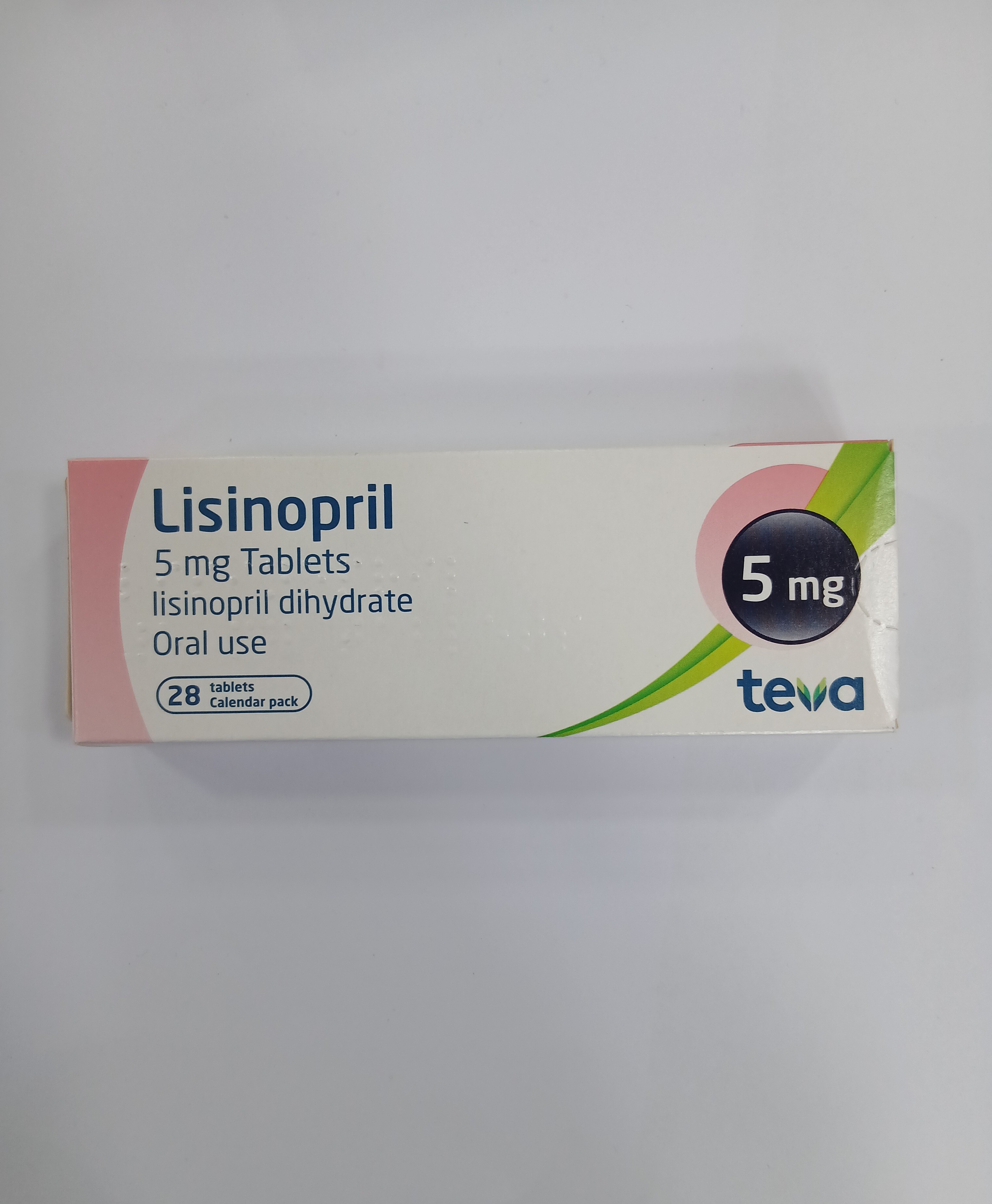 White cardboard box packaging with a pink and green label displays text indicating 28 tablets inside, each labeled as 5 mg oral use.