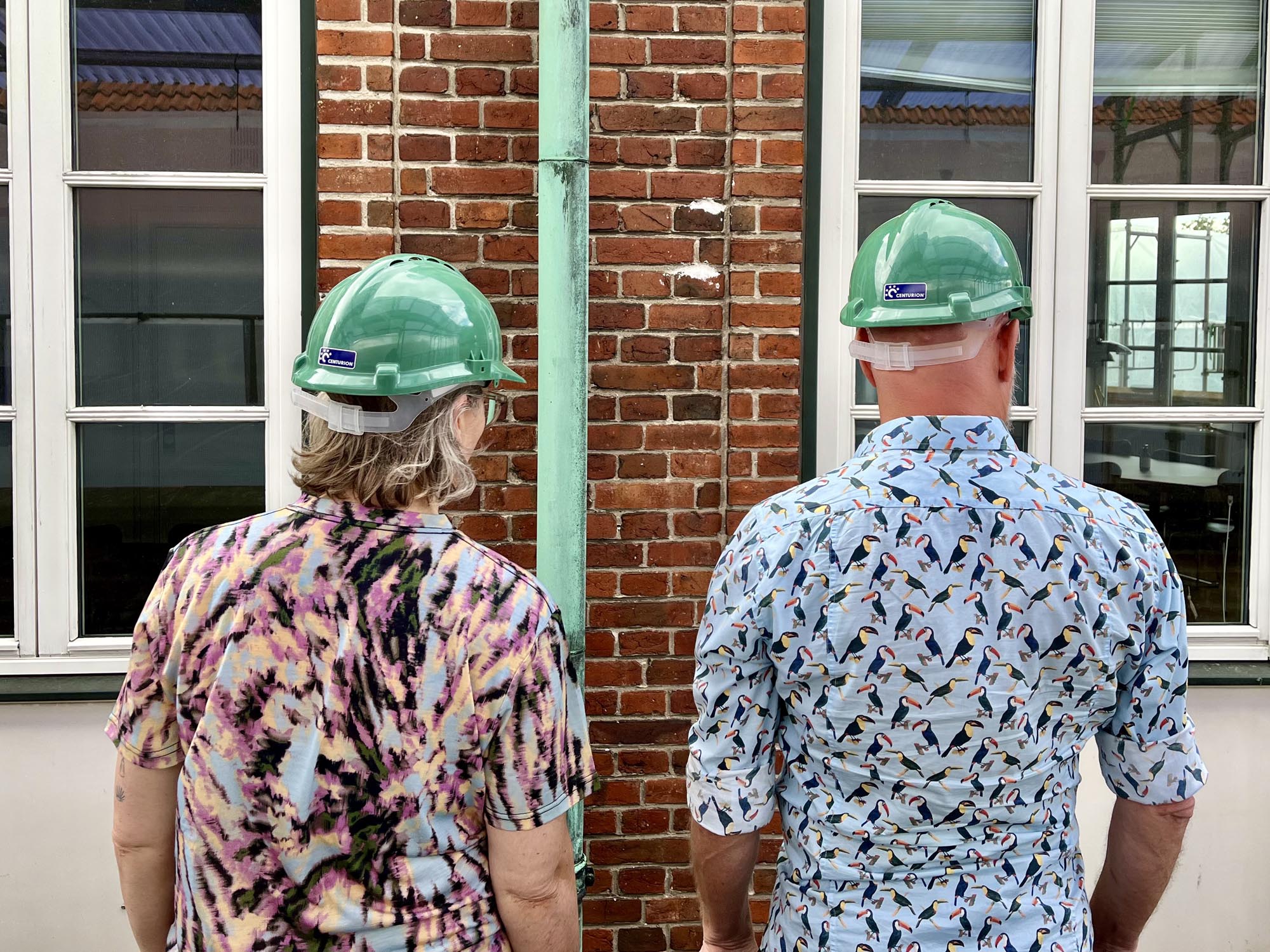 cars on road near buildings during daytime
