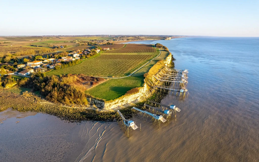 Gironde-munningen. Her ligger små, sjarmerende havner som minner om områdets lange historie med vinhandel | Expa Travel